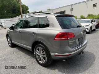 2016 Volkswagen Touareg Sport с VIN WVGEF9BP9GD007210, выставлен на аукционе Copart как лот 61608015 с пробегом 192 156 миль миль и Чистый • Clean title. История ставок и продаж доступна на DreamBid. Изображение 4.