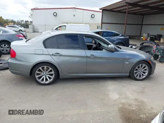 2011 BMW 3 Series 328i with VIN WBAPH5G52BNM84035, listed as a IAAI auction lot 42046301 with 165,418 mi miles. Bid and sale history available at carsss.com. Image 13.