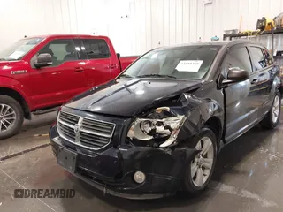 2011 Dodge Caliber Mainstreet with VIN 1B3CB3HA2BD148279, listed as a IAAI auction lot 42150488 with 131,278 mi miles and . Bid and sale history available at DreamBid. Image 6.