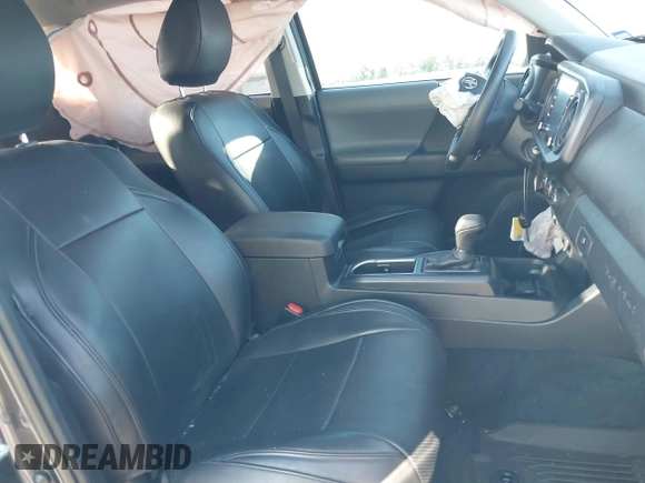 2021 Toyota Tacoma SR with VIN 3TYAX5GN5MT032481, listed as a IAAI auction lot 41979320 with 51,843 mi miles and . Bid and sale history available at DreamBid. Image 5.