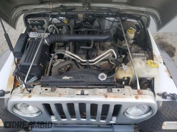 2004 Jeep Wrangler X with VIN 1J4FA39S74P724420, listed as a Copart auction lot 71839944 with 135,742 mi miles and Clean Title. Bid and sale history available at carsss.com. Image 11.