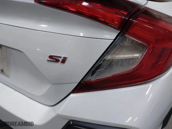 2020 Honda Civic Si Sedan with VIN 2HGFC1E53LH705291, listed as a IAAI auction lot 41271074 with 137,690 mi miles. Bid and sale history available at carsss.com. Image 21.