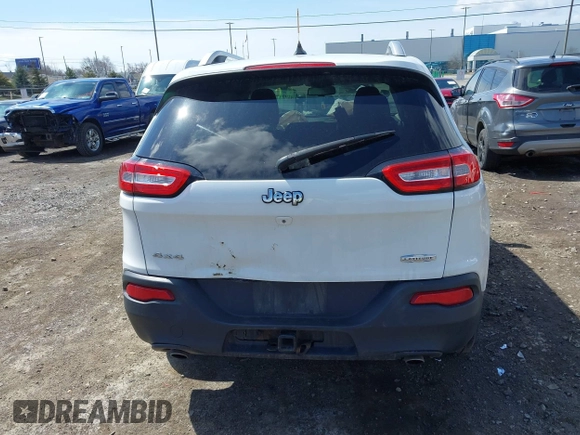 2014 Jeep Cherokee Latitude with VIN 1C4PJMCS8EW192482, listed as a IAAI auction lot 41994546 with 116,839 mi miles and . Bid and sale history available at carsss.com. Image 16.