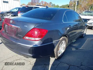 2005 Acura RL z VIN JH4KB16525C019908, wystawiony jako IAAI lot #41106944 z przebiegiem 203 359 mil mil oraz . Historia ofert i sprzedaży dostępna na DreamBid. Obrazek 4.
