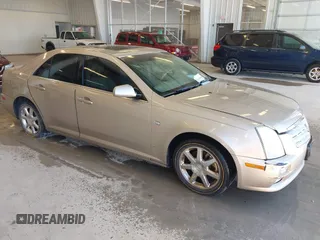 2006 Cadillac STS with VIN 1G6DW677960189779, listed as a IAAI auction lot 41736744 with 165,125 mi miles. Bid and sale history available at carsss.com. Image 1.
