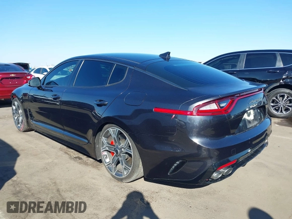 2019 Kia Stinger GT with VIN KNAE35LC3K6059198, listed as a IAAI auction lot 41599686 with 82,886 mi miles. Bid and sale history available at carsss.com. Image 3.