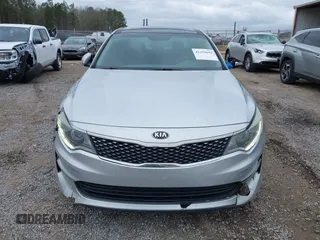 2016 Kia Optima EX z VIN 5XXGU4L36GG070336, wystawiony jako IAAI lot #41259692 z przebiegiem 124 807 mil mil oraz . Historia ofert i sprzedaży dostępna na DreamBid. Obrazek 13.