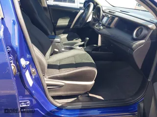 2015 Toyota RAV4 XLE with VIN 2T3WFREV7FW164738, listed as a IAAI auction lot 41950023 with 122,672 mi miles. Bid and sale history available at carsss.com. Image 5.