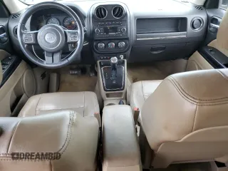 2014 Jeep Patriot High Altitude with VIN 1C4NJPFA2ED888925, listed as a Copart auction lot 60191435 with 122,308 mi miles and Salvage title. Bid and sale history available at DreamBid. Image 8.