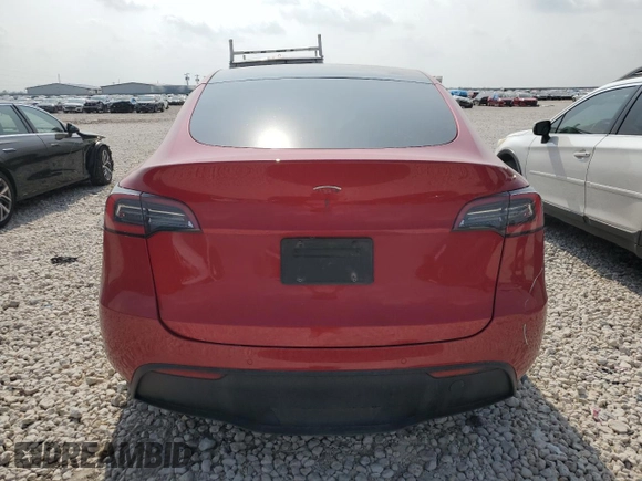 2021 Tesla Model Y Standard Range with VIN 5YJYGDED5MF116562, listed as a Copart auction lot 51211535 with 68,549 mi miles and Salvage Title. Bid and sale history available at DreamBid. Image 6.