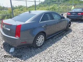 2011 Cadillac CTS with VIN 1G6DC5EY0B0163841, listed as a IAAI auction lot 42409886 with 119,231 mi miles and . Bid and sale history available at DreamBid. Image 4.