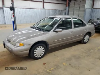 1995 Ford Contour LX with VIN 1FALP6531SK243263, listed as a Copart auction lot 50590725 with 105,347 mi miles and Salvage Title. Bid and sale history available at DreamBid. Image 1.