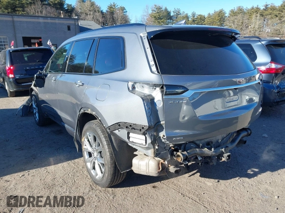 2020 Cadillac XT6 AWD Sport z VIN 1GYKPGRS8LZ150613, wystawiony jako IAAI lot #41275209 z przebiegiem 33 651 mil mil oraz . Historia ofert i sprzedaży dostępna na DreamBid. Obrazek 3.