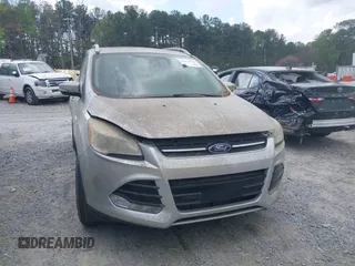 2015 Ford Escape Titanium with VIN 1FMCU0J98FUA87044, listed as a IAAI auction lot 41952096 with 257,437 mi miles. Bid and sale history available at carsss.com. Image 6.
