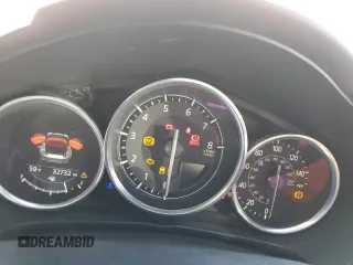 2020 Mazda MX-5 Miata Grand Touring z VIN JM1NDAD74L0416564, wystawiony jako Copart lot #80306624 z przebiegiem 32 732 mil mil oraz Szkoda całkowita • Salvage title. Historia ofert i sprzedaży dostępna na DreamBid. Obrazek 9.