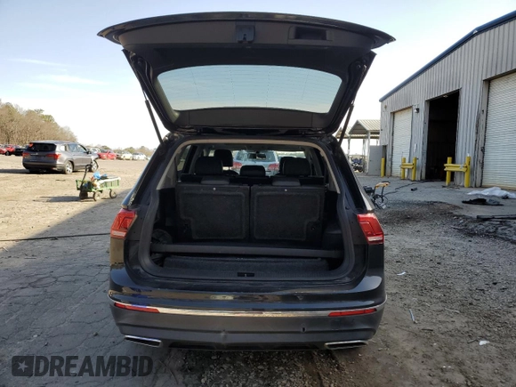 2018 Volkswagen Tiguan SEL with VIN 3VV3B7AX2JM137890, listed as a Copart auction lot 48318645 with 112,602 mi miles and Salvage title. Bid and sale history available at DreamBid. Image 6.