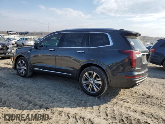 2021 Cadillac XT6 Premium Luxury z VIN 1GYKPCRS6MZ205831, wystawiony jako Copart lot #47259215 z przebiegiem 31 959 mil mil oraz Szkody całkowita. Historia ofert i sprzedaży dostępna na DreamBid. Obrazek 2.