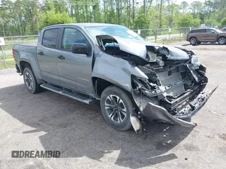 2021 Chevrolet Colorado 2WD Z71 with VIN 1GCGSDEN9M1285771, listed as a IAAI auction lot 42145234 with 16,640 mi miles and . Bid and sale history available at DreamBid. Image 1.