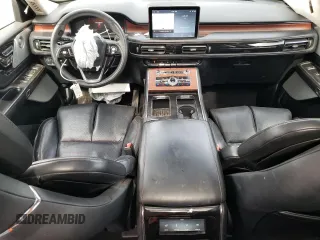 2020 Lincoln Aviator Reserve z VIN 5LM5J7XC2LGL35647, wystawiony jako Copart lot #71263444 z przebiegiem 56 792 mil mil oraz Szkoda całkowita • Salvage title. Historia ofert i sprzedaży dostępna na DreamBid. Obrazek 8.