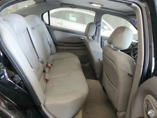 2000 Nissan Maxima GXE z VIN JN1CA31A1YT211725, wystawiony jako Copart lot #47401895 z przebiegiem 122 228 mil mil oraz Szkody całkowita. Historia ofert i sprzedaży dostępna na DreamBid. Obrazek 10.