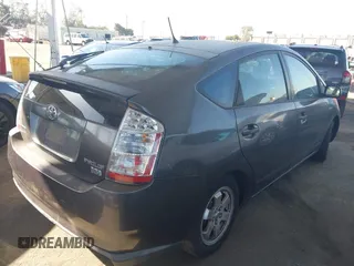 2007 Toyota Prius z VIN JTDKB20U873226409, wystawiony jako IAAI lot #42541909 z przebiegiem 128 374 mil mil oraz . Historia ofert i sprzedaży dostępna na DreamBid. Obrazek 4.