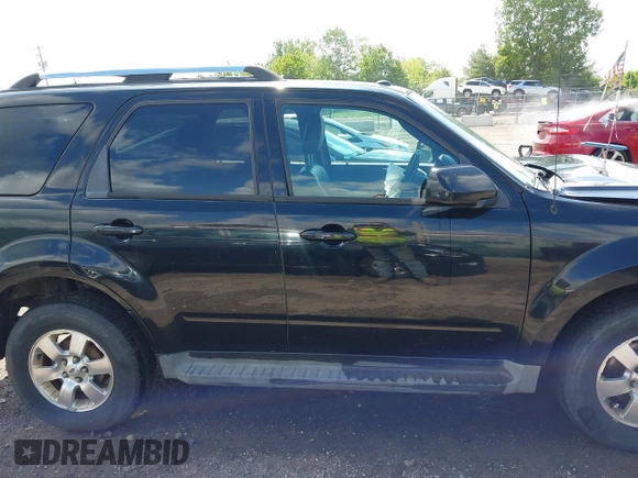2010 Ford Escape Limited with VIN 1FMCU9E75AKD36580, listed as a IAAI auction lot 42335561 with 164,565 mi miles and . Bid and sale history available at DreamBid. Image 13.