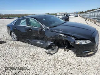 2012 Jaguar XJ with VIN SAJWA1CB2CLV38648, listed as a Copart auction lot 50264545 with Not Provided miles and Salvage Title. Bid and sale history available at DreamBid. Image 4.