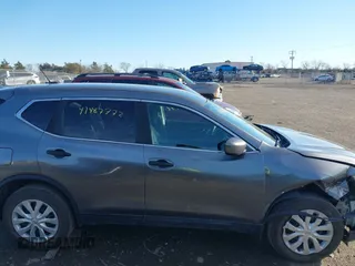 2016 Nissan Rogue S z VIN 5N1AT2MM3GC772470, wystawiony jako IAAI lot #41487772 z przebiegiem 180 175 mil mil oraz . Historia ofert i sprzedaży dostępna na DreamBid. Obrazek 13.