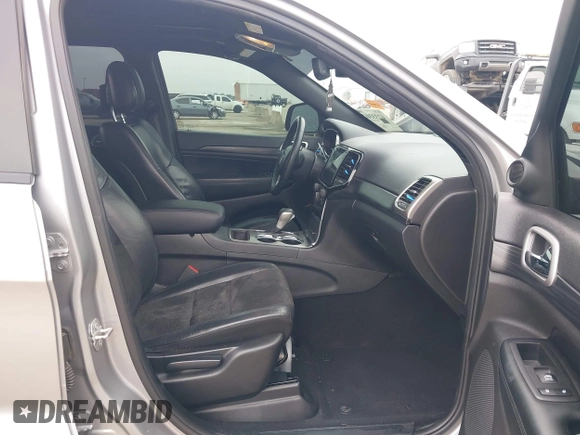 2019 Jeep Grand Cherokee Laredo E with VIN 1C4RJFAG9KC670974, listed as a IAAI auction lot 42333028 with 163,958 mi miles and . Bid and sale history available at DreamBid. Image 5.