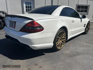 2012 Mercedes-Benz SL-Class SL 550 with VIN WDBSK7BA5CF168279, listed as a IAAI auction lot 42070913 with 130,820 mi miles. Bid and sale history available at carsss.com. Image 4.