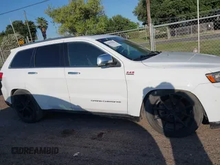 2015 Jeep Grand Cherokee Summit with VIN 1C4RJFJT5FC767687, listed as a IAAI auction lot 42015878 with 1 mi miles. Bid and sale history available at carsss.com. Image 13.