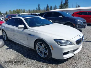 2014 BMW 6 Series 640i z VIN WBA6A0C57ED317446, wystawiony jako IAAI lot #42056981 z przebiegiem 113 914 mil mil oraz . Historia ofert i sprzedaży dostępna na DreamBid. Obrazek 1.