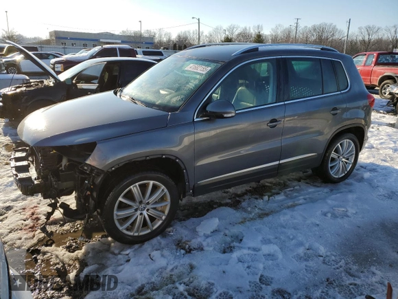 2014 Volkswagen Tiguan SE z VIN WVGAV3AXXEW505398, wystawiony jako Copart lot #41682155 z przebiegiem 137 147 mil mil oraz Nie do naprawy • Non repairable. Historia ofert i sprzedaży dostępna na DreamBid. Obrazek 1.