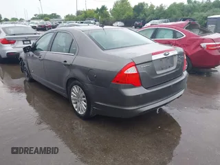2010 Ford Fusion Hybrid with VIN 3FADP0L37AR242651, listed as a IAAI auction lot 42457758 with 196,894 mi miles and . Bid and sale history available at DreamBid. Image 3.