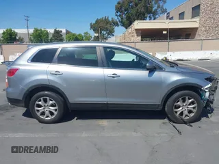 2011 Mazda CX-9 Sport with VIN JM3TB2BVXB0307360, listed as a IAAI auction lot 42580629 with 136,928 mi miles and . Bid and sale history available at DreamBid. Image 14.