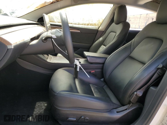 2021 Tesla Model 3 Standard Range Plus z VIN 5YJ3E1EA1MF096234, wystawiony jako Copart lot #53093815 z przebiegiem 14 019 mil mil oraz Szkody całkowita. Historia ofert i sprzedaży dostępna na DreamBid. Obrazek 7.