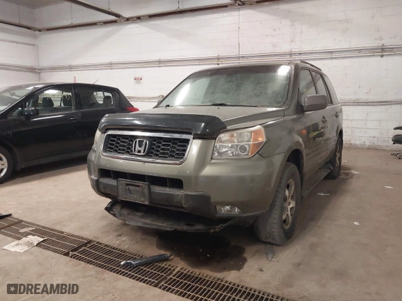 2007 Honda Pilot EX-L with VIN 5FNYF18557B009179, listed as a IAAI auction lot 41952140 with 300,471 mi miles. Bid and sale history available at carsss.com. Image 6.