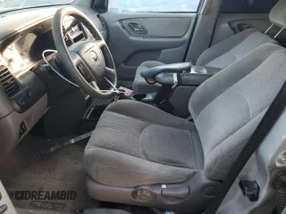 2002 Mazda Tribute LX with VIN 4F2YU09182KM64860, listed as a Copart auction lot 77391824 with 207,965 mi miles and Salvage Title. Bid and sale history available at DreamBid. Image 7.