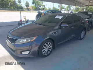 2015 Kia Optima EX z VIN 5XXGN4A7XFG497858, wystawiony jako IAAI lot #42156724 z przebiegiem 109 028 mil mil oraz . Historia ofert i sprzedaży dostępna na DreamBid. Obrazek 2.