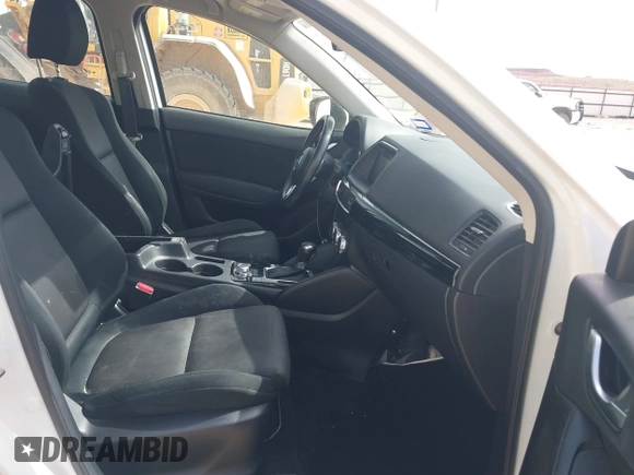 2016 Mazda CX-5 Sport with VIN JM3KE2BYXG0683318, listed as a IAAI auction lot 41777751 with 116,922 mi miles. Bid and sale history available at carsss.com. Image 5.