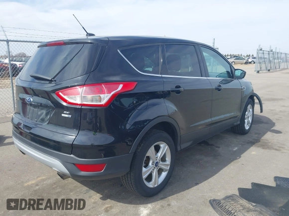 2014 Ford Escape SE with VIN 1FMCU9G91EUA07321, listed as a IAAI auction lot 41807424 with 149,276 mi miles and . Bid and sale history available at DreamBid. Image 4.