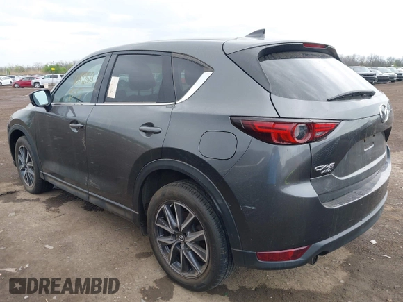 2017 Mazda CX-5 Grand Touring with VIN JM3KFBDL3H0143194, listed as a IAAI auction lot 42049258 with 74,159 mi miles. Bid and sale history available at carsss.com. Image 3.