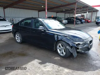2015 BMW 3 Series 328i with VIN WBA3C1C53FK119723, listed as a IAAI auction lot 41871200 with 112,552 mi miles and . Bid and sale history available at carsss.com. Image 1.