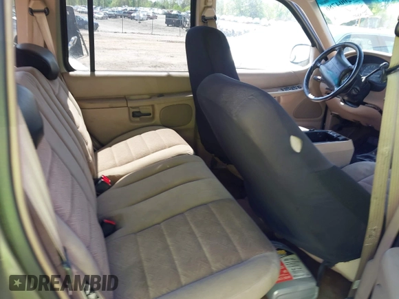 2000 Ford Explorer XLT with VIN 1FMZU63E0YZC65266, listed as a IAAI auction lot 42004786 with 273,397 mi miles and . Bid and sale history available at DreamBid. Image 8.