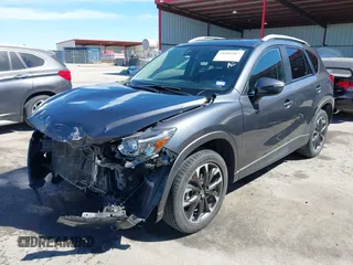 2016 Mazda CX-5 Grand Touring with VIN JM3KE2DY9G0824196, listed as a IAAI auction lot 41801887 with 88,625 mi miles. Bid and sale history available at carsss.com. Image 19.