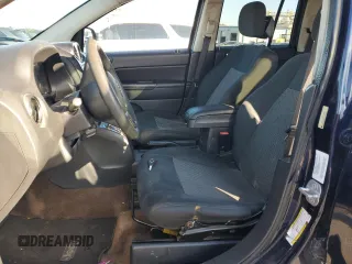 2014 Jeep Compass Sport with VIN 1C4NJCBA5ED749869, listed as a Copart auction lot 52779135 with 166,962 mi miles and Salvage Title. Bid and sale history available at carsss.com. Image 7.