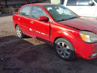 2011 Kia Rio LX with VIN KNADH4A33B6714471, listed as a IAAI auction lot 41970737 with 188,214 mi miles. Bid and sale history available at carsss.com. Image 12.