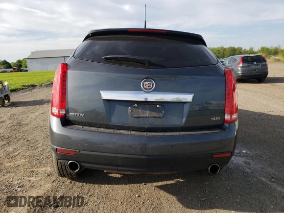 2012 Cadillac SRX Performance Collection z VIN 3GYFNBE3XCS611543, wystawiony jako Copart lot #56628975 z przebiegiem 61 825 mil mil oraz Szkoda całkowita • Salvage title. Historia ofert i sprzedaży dostępna na DreamBid. Obrazek 6.