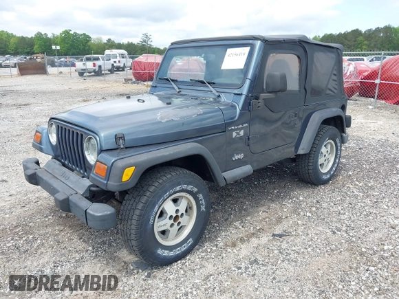 2002 Jeep Wrangler X with VIN 1J4FA39S92P736825, listed as a IAAI auction lot 42156410 with 196,313 mi miles. Bid and sale history available at carsss.com. Image 2.