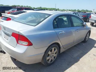 2009 Honda Civic Sdn LX with VIN 2HGFA16599H518263, listed as a IAAI auction lot 42006093 with 368,179 mi miles. Bid and sale history available at carsss.com. Image 4.